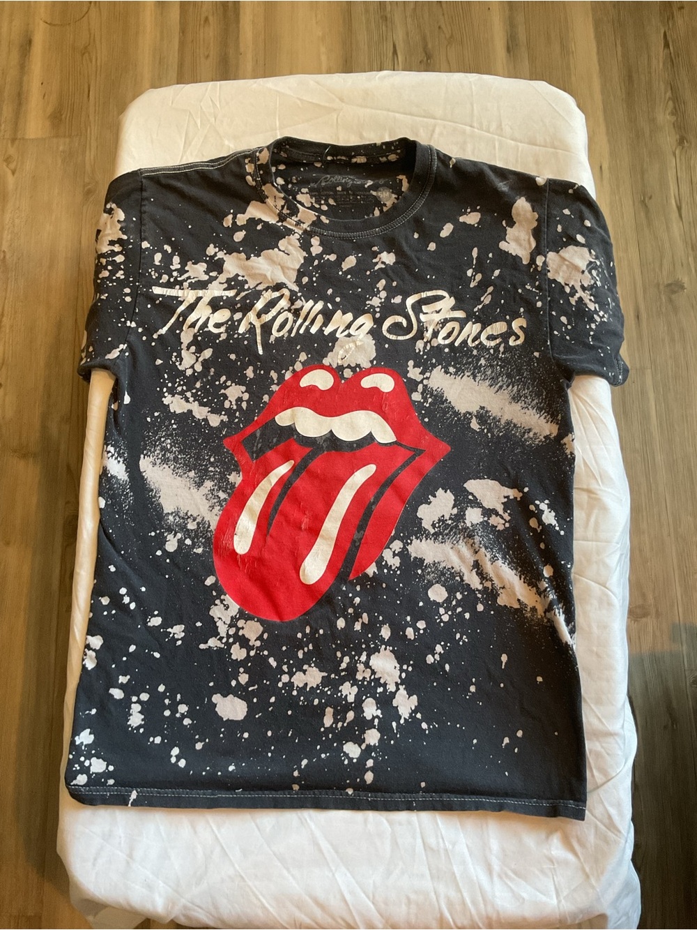 the Rolling Stones Black Tee with Red Tongue and White Bleach Splatter